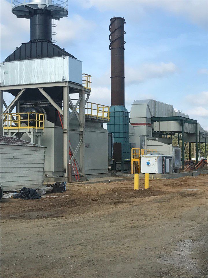 Piping and a turbine tower at a power generation facility